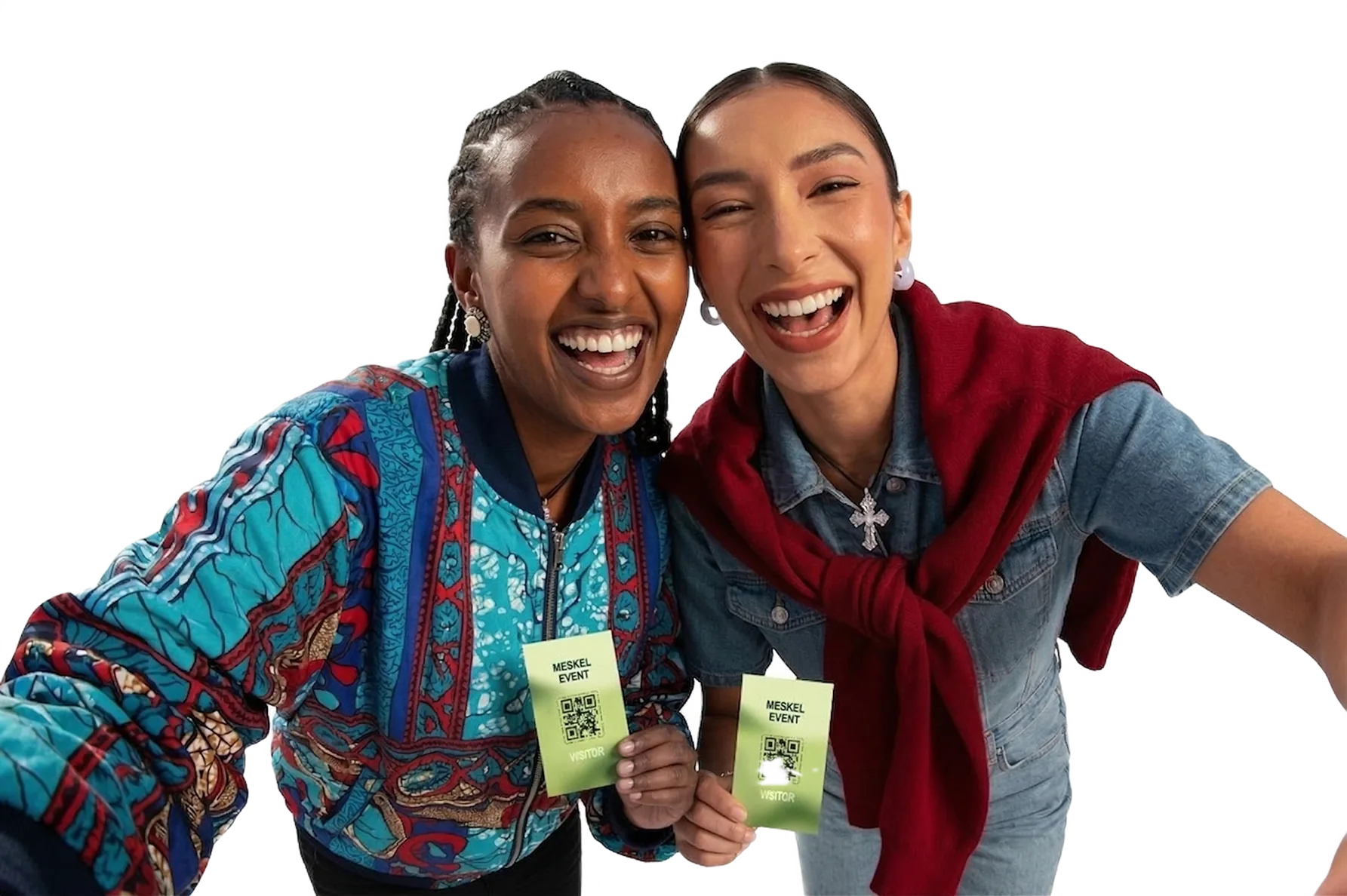 Two organizers celebrating with cash in hand